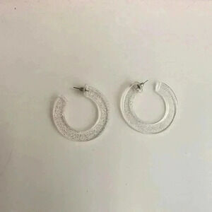 Clear sparkly chunky hoop earrings.
